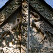 The carved-oak pediment on the Porch